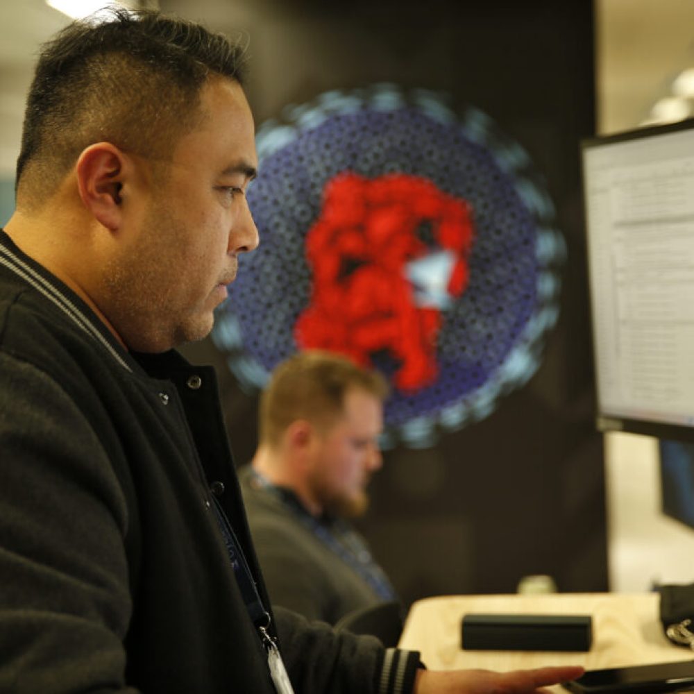 CyberCX staff negotiate computer systems and online threats at the offices of CyberCX, Sydney, Australia. May 2023. Photograph by James Alcock/CyberCX (C)